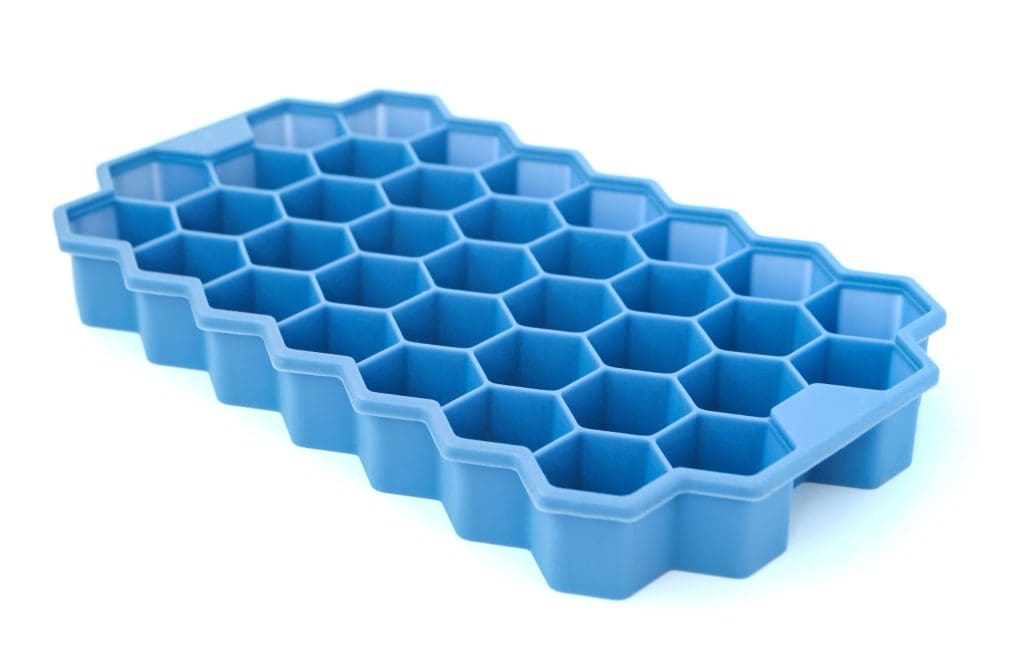 Silicone mold for freezing ice isolated on white background Silicone mold for freezing ice isolated on white background
