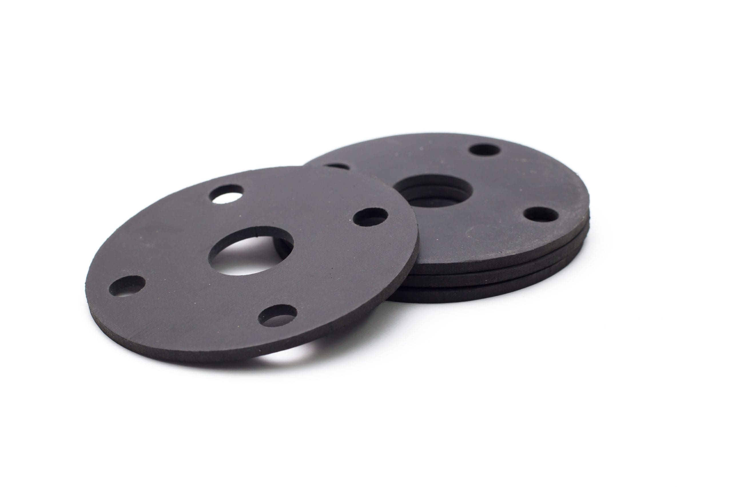 Black rubber flange gasket on a white background. custom rubber seals