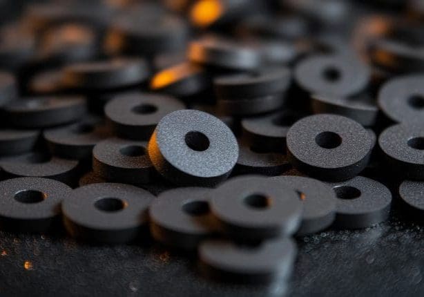 Carefully organized black rubber gaskets highlight their precise shapes and quality, emphasizing their crucial role in various industrial applications Die Cut rubber Seals